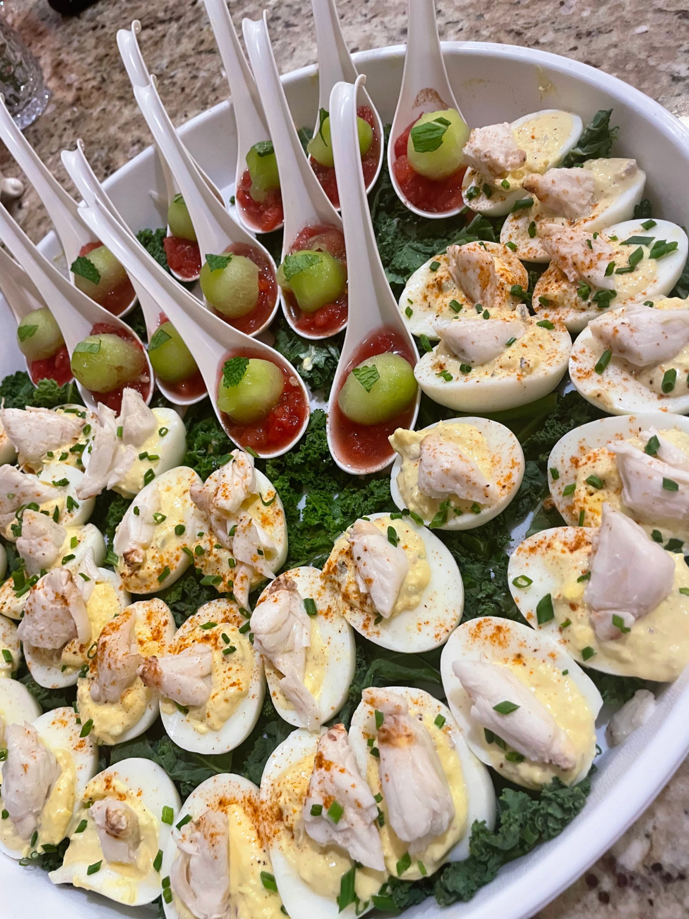 Private chef appetizer platter with deviled eggs and melon bites